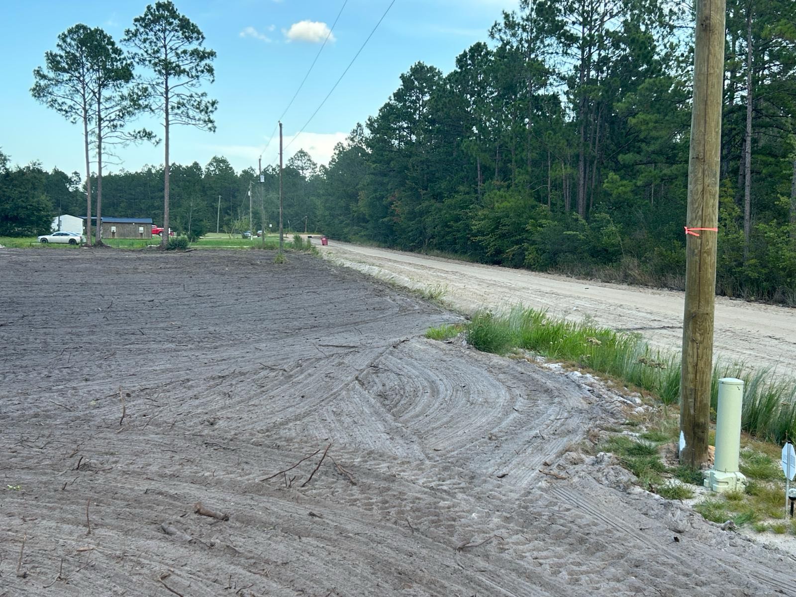 Graded drive cut through the property